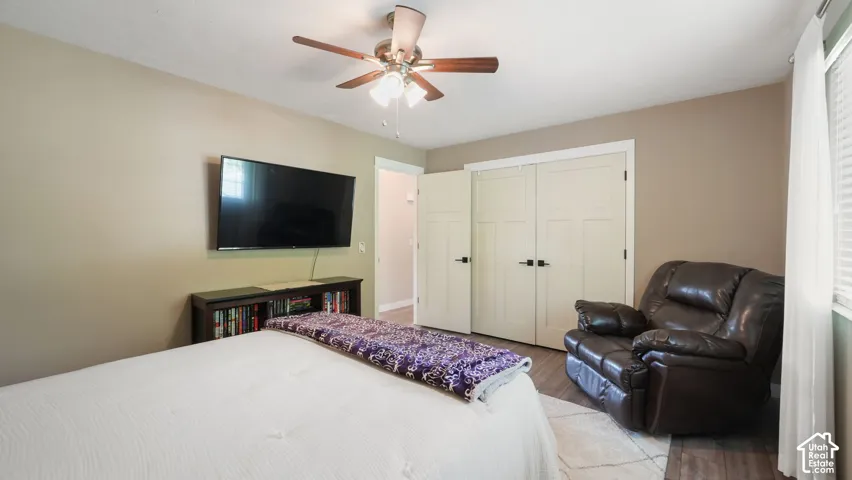 Recessed lighting, wood-finish flooring, ceiling fan, and panel doors