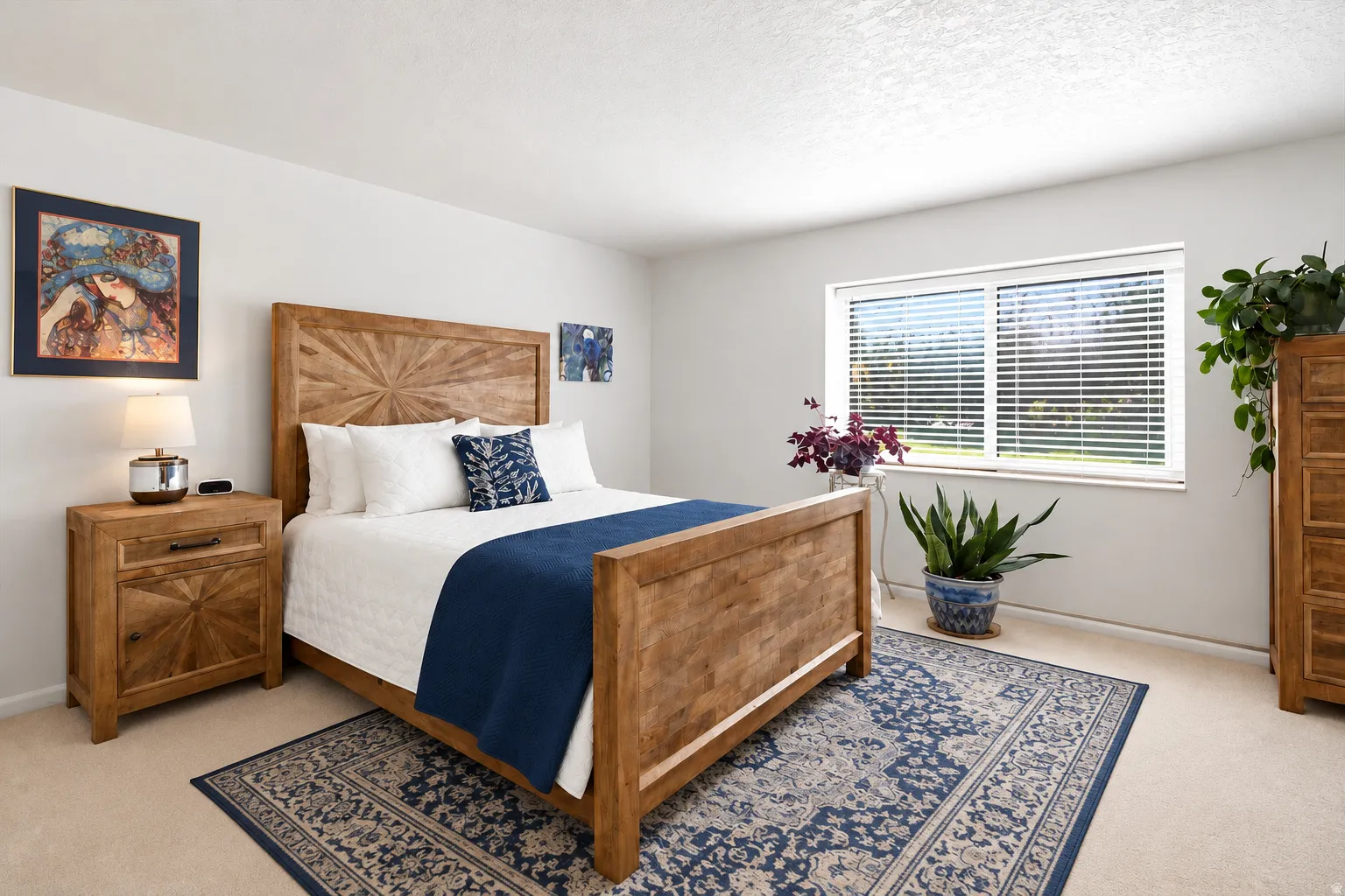 Window with blinds, wall-to-wall carpeting, and light-toned walls