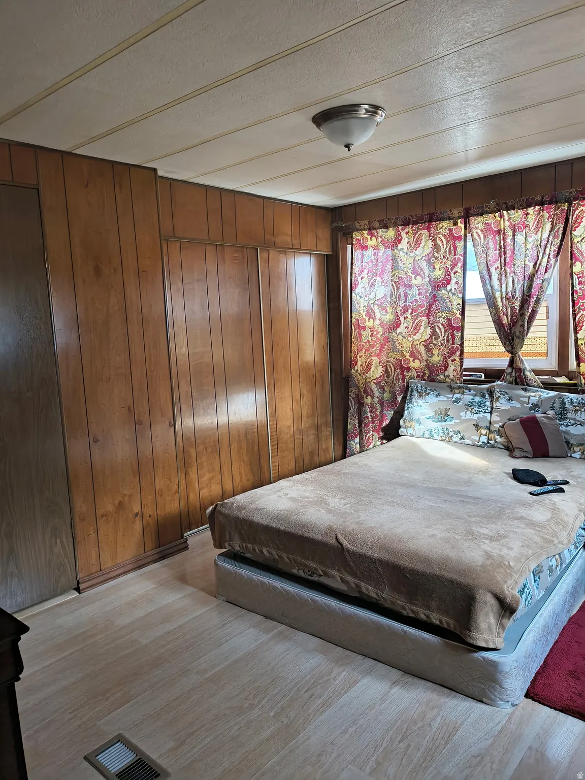 Wood-finish wall paneling with integrated storage