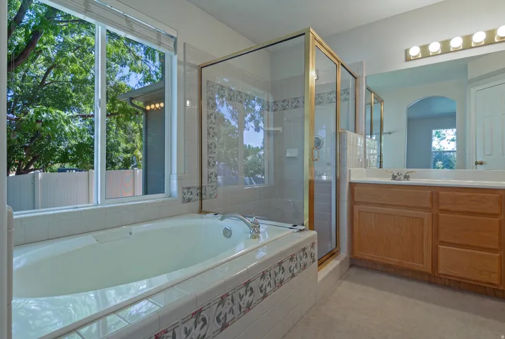 Soaking tub with decorative tile surround