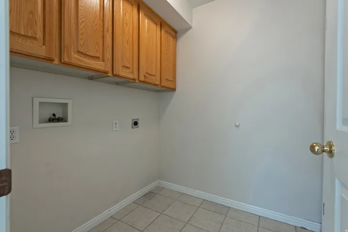 Upper cabinetry with wood-finish doors