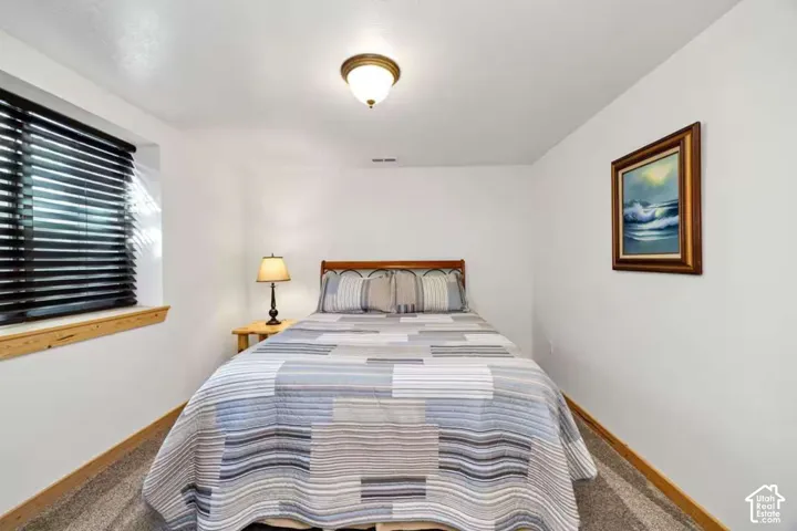 Recessed window with wood trim and horizontal blinds