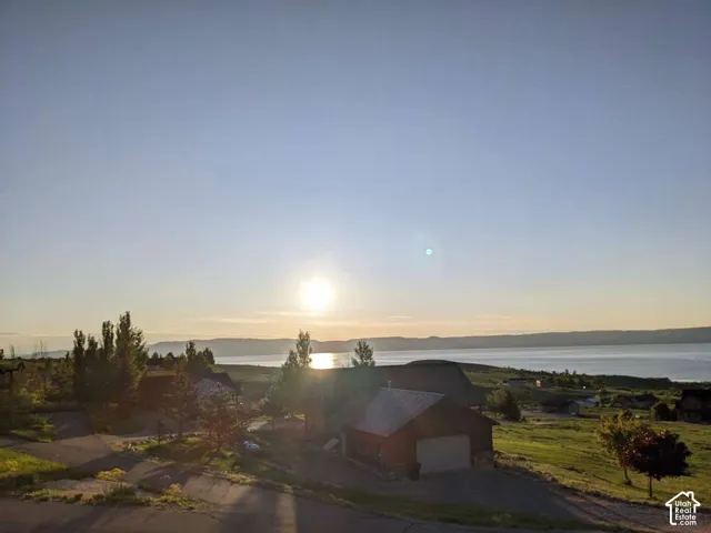 Expansive body of water with distant mountainous terrain