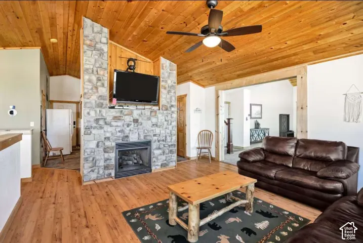 Stone-clad fireplace with a built-in television mount