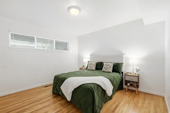 Primary Bedroom with walk in closet.  Queen size bed for scale.  Could easily fit a king size bed.