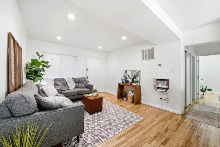 Awesome open floor plan with original hardwood flooring.
