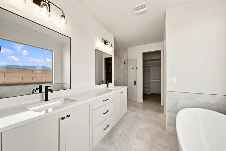 Dual vanity with undermount sinks and matte black fixtures