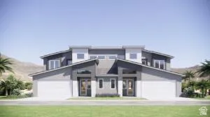 View of front of house with a front yard and concrete driveway