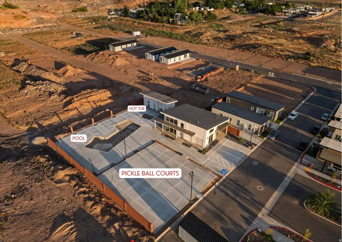 Community amenities featuring a pool, hot tub, and pickleball courts