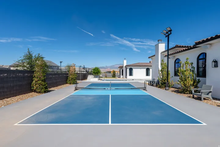 Outdoor sport court with blue surfacing