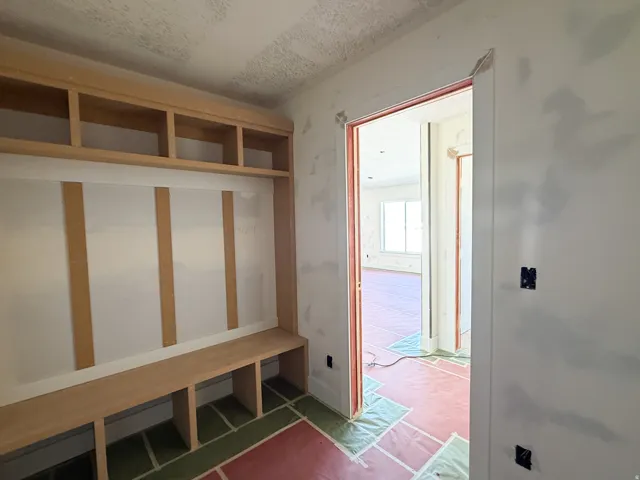 Built-in storage bench with overhead cubbies