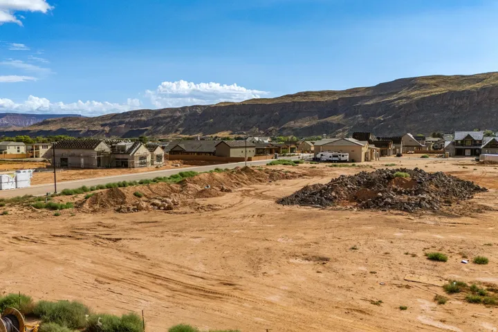 Expansive undeveloped land with a distant mountain backdrop
