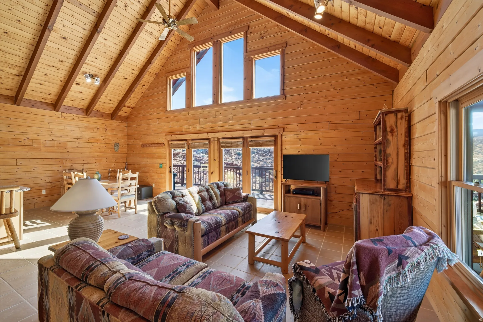 Vaulted wood-paneled ceilings with exposed beams