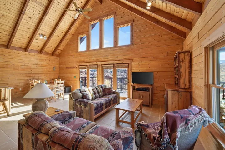 Vaulted wood-paneled ceilings with exposed beams