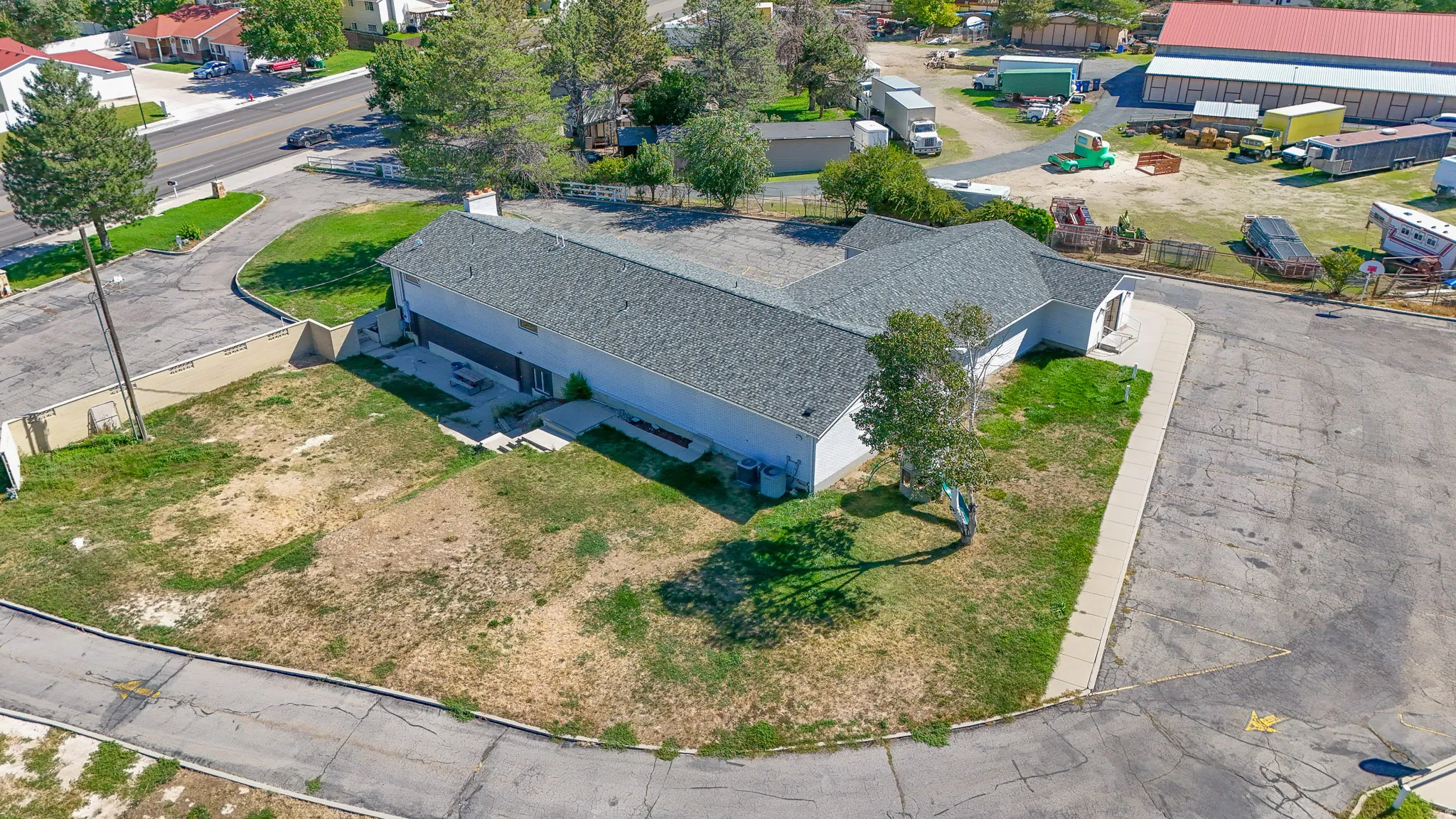 Single-story commercial building with an asphalt shingle roof