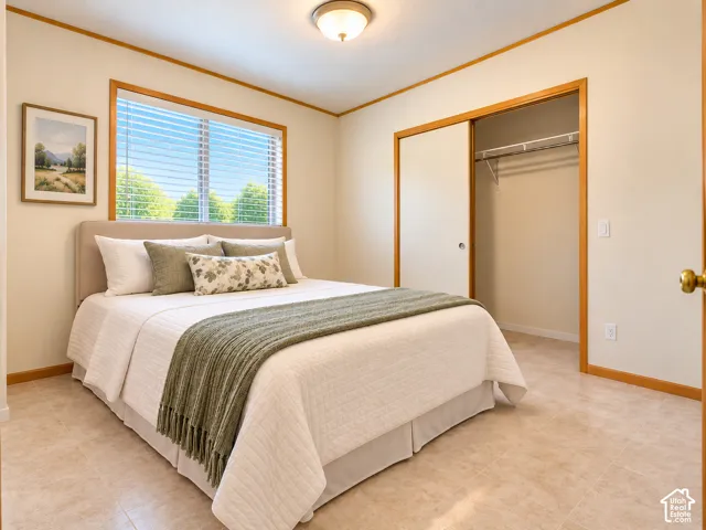 Primary Suite. New Carpet. Full Bath. Neutral-toned walls with wood trim details