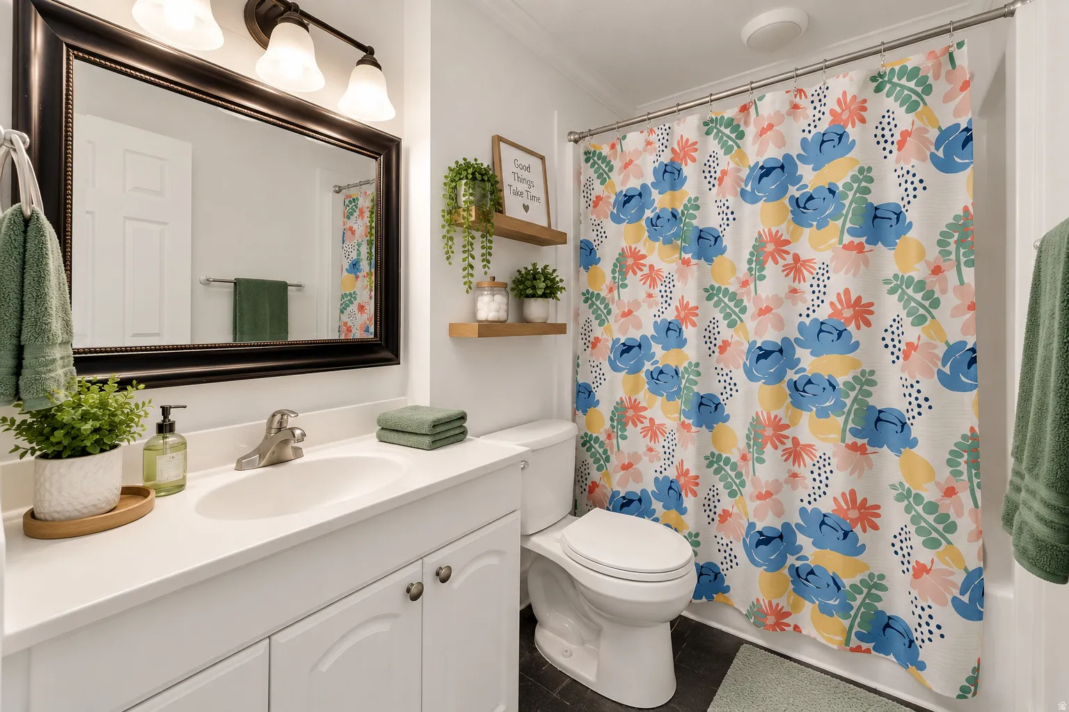 White vanity with integrated sink, chrome faucet, and storage cabinetry