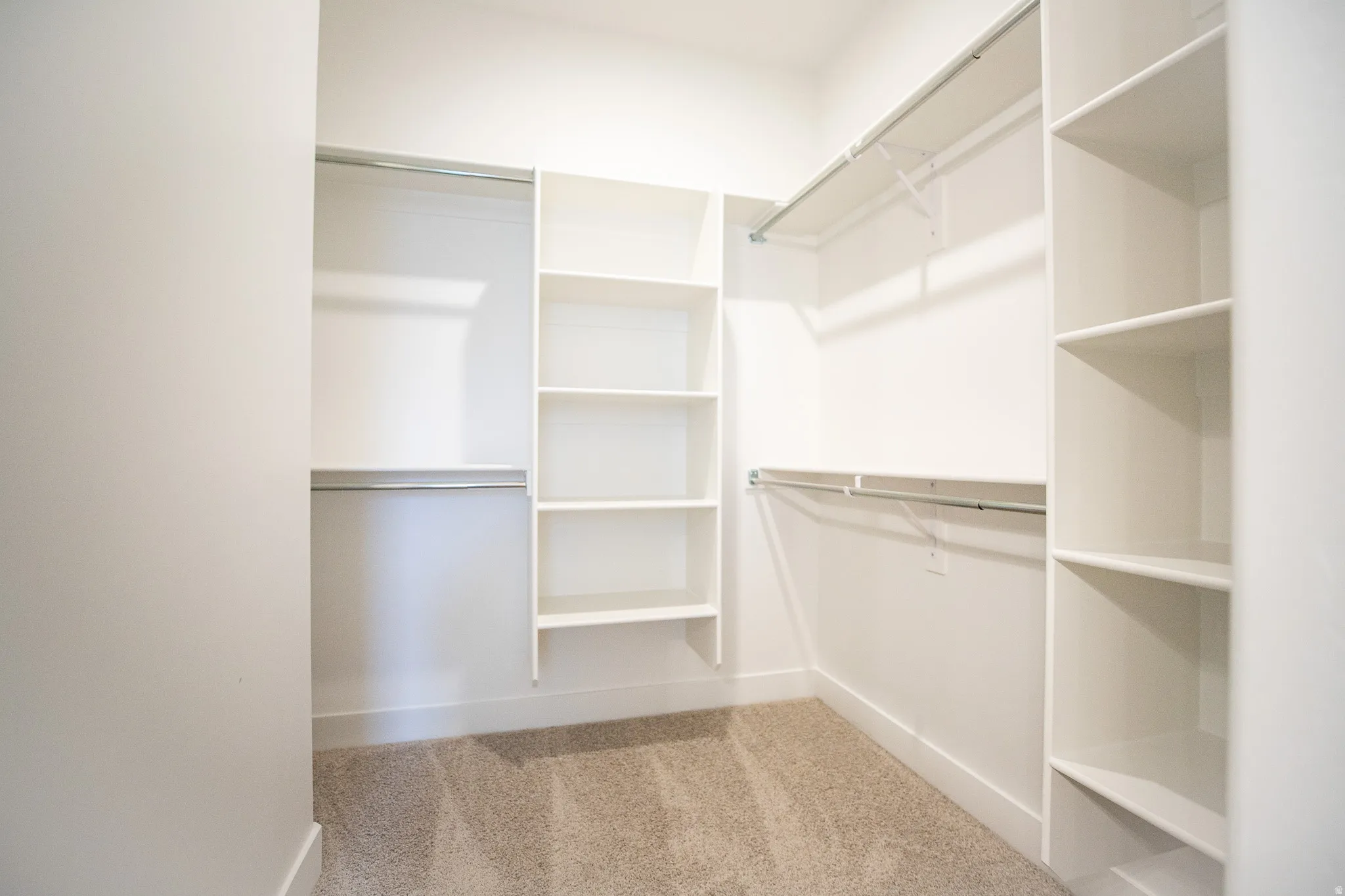 Large walk-in closet as part of primary suite.