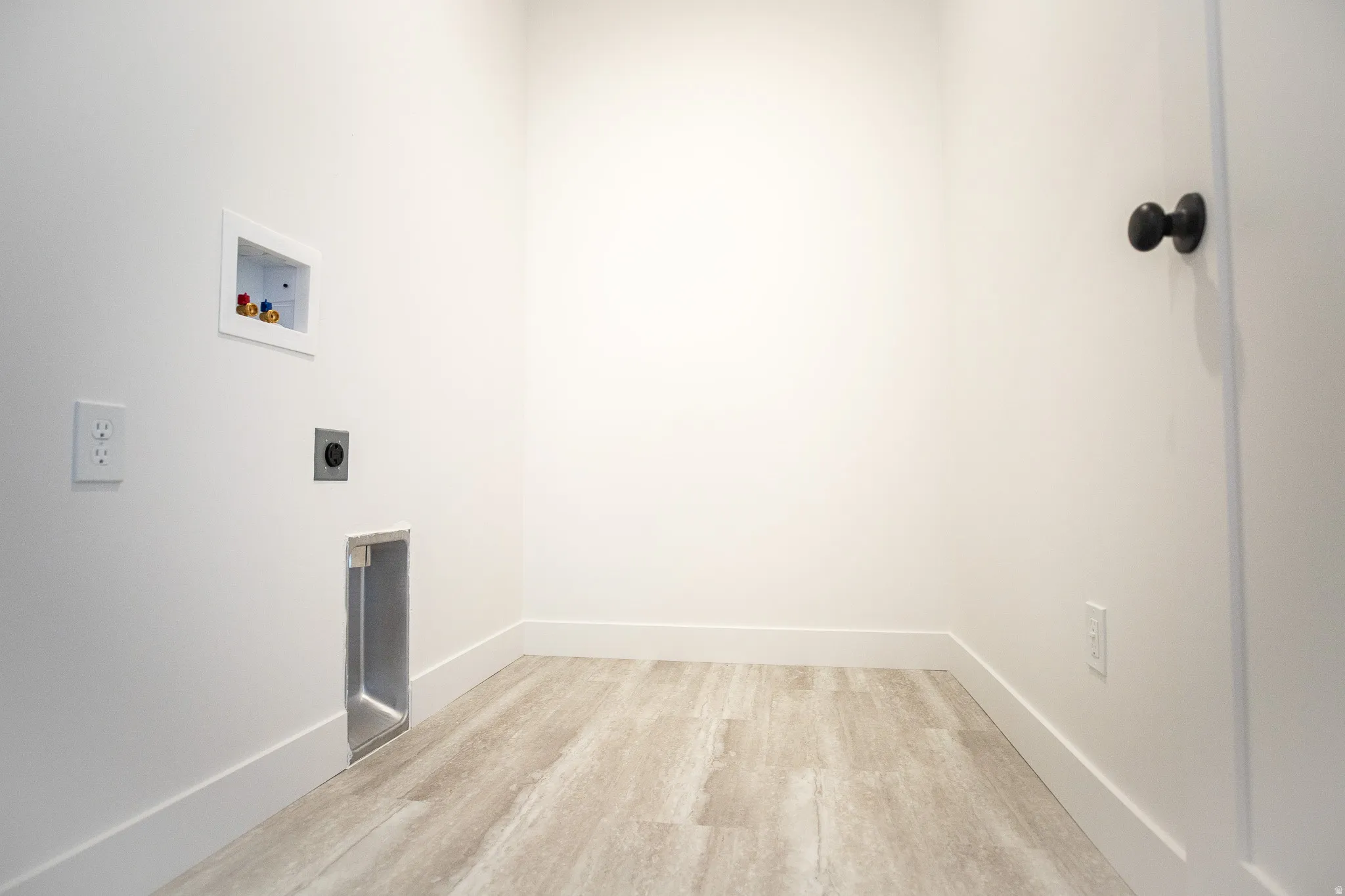 Full-size, dedicated laundry room with washer/dryer hookups.