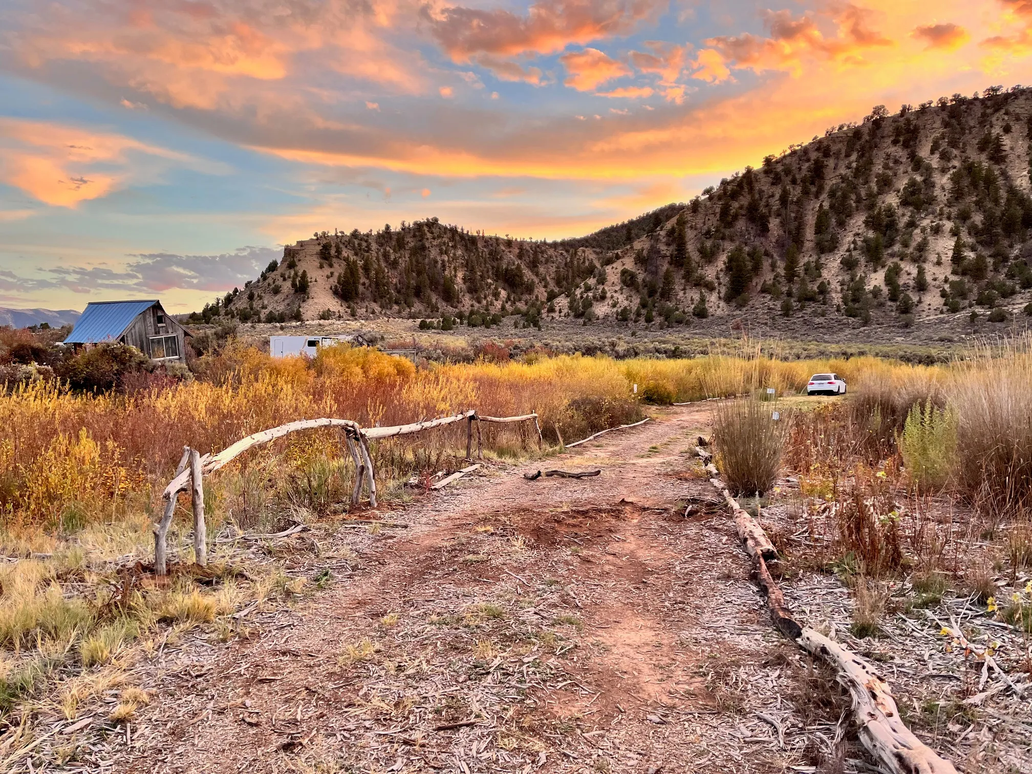 Rustic wood fence with a mountain backdrop