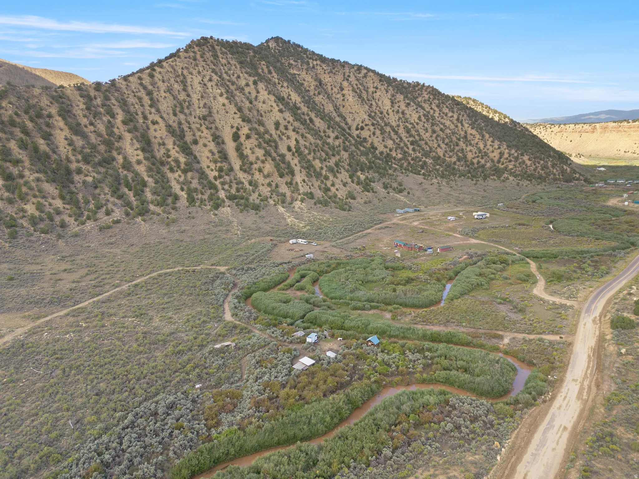 Expansive natural landscape with a winding waterway