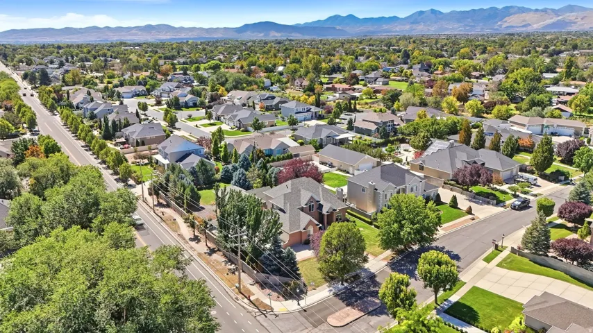 Residential neighborhood featuring varied architectural styles and mature landscaping