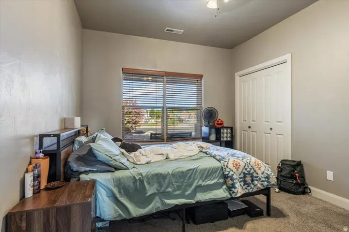 Neutral wall tones and textured carpeting