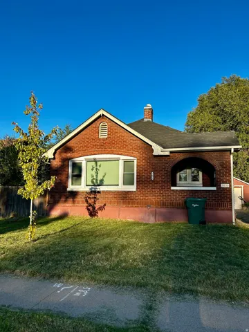 Brick exterior with an arched entryway