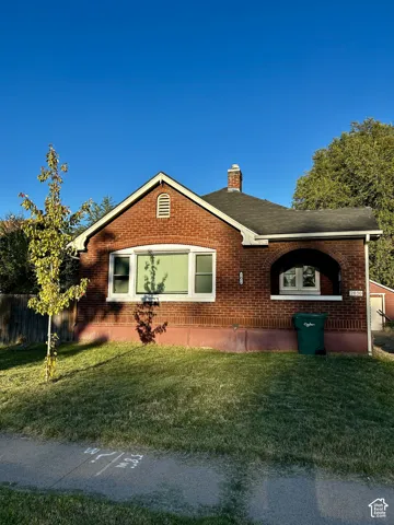 Brick exterior with an arched entryway