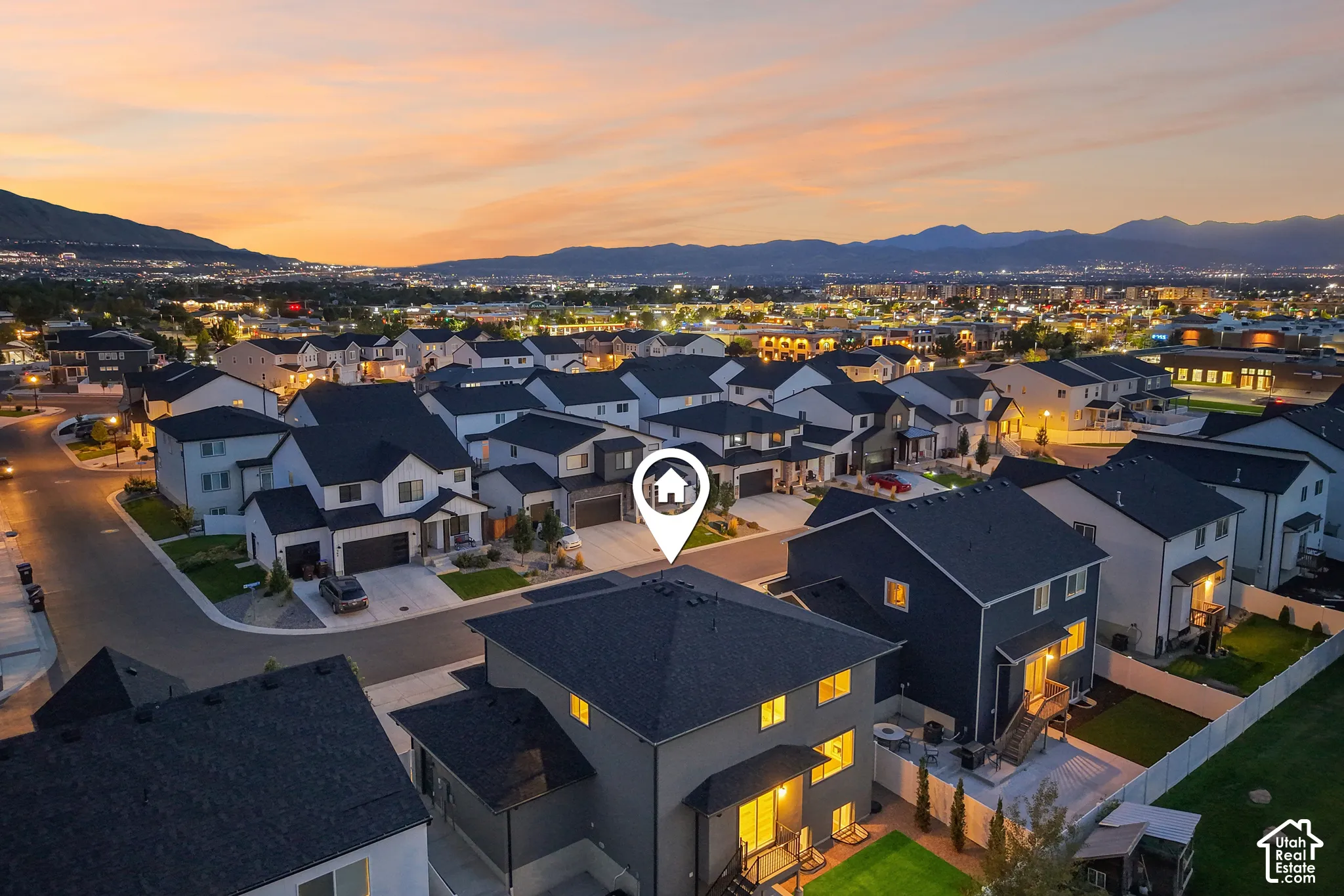 Modern residential neighborhood featuring mountain scenery and established streets