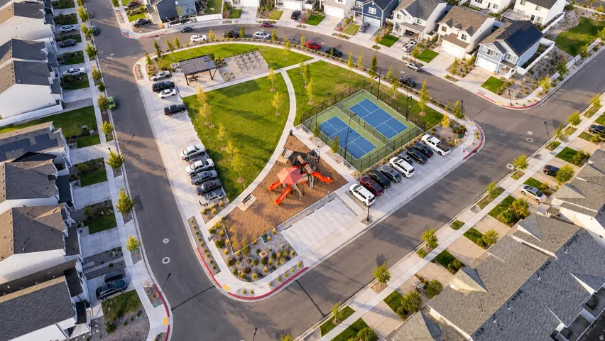 Neighborhood featuring a green space, tennis courts, covered picnic area, and playground