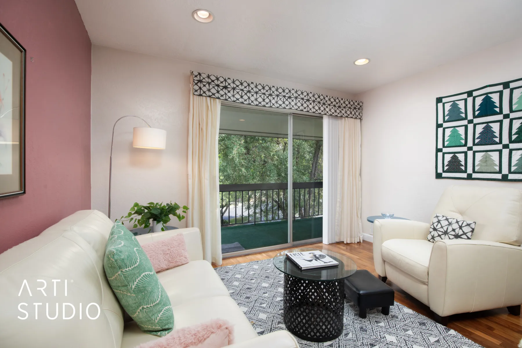 Sliding glass door opening to an outdoor balcony, recessed lighting, wood-finish flooring, and a decorative valance