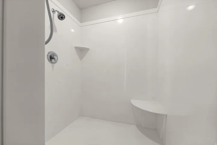 Primary Bathroom, walk in double head shower with a handheld spray
