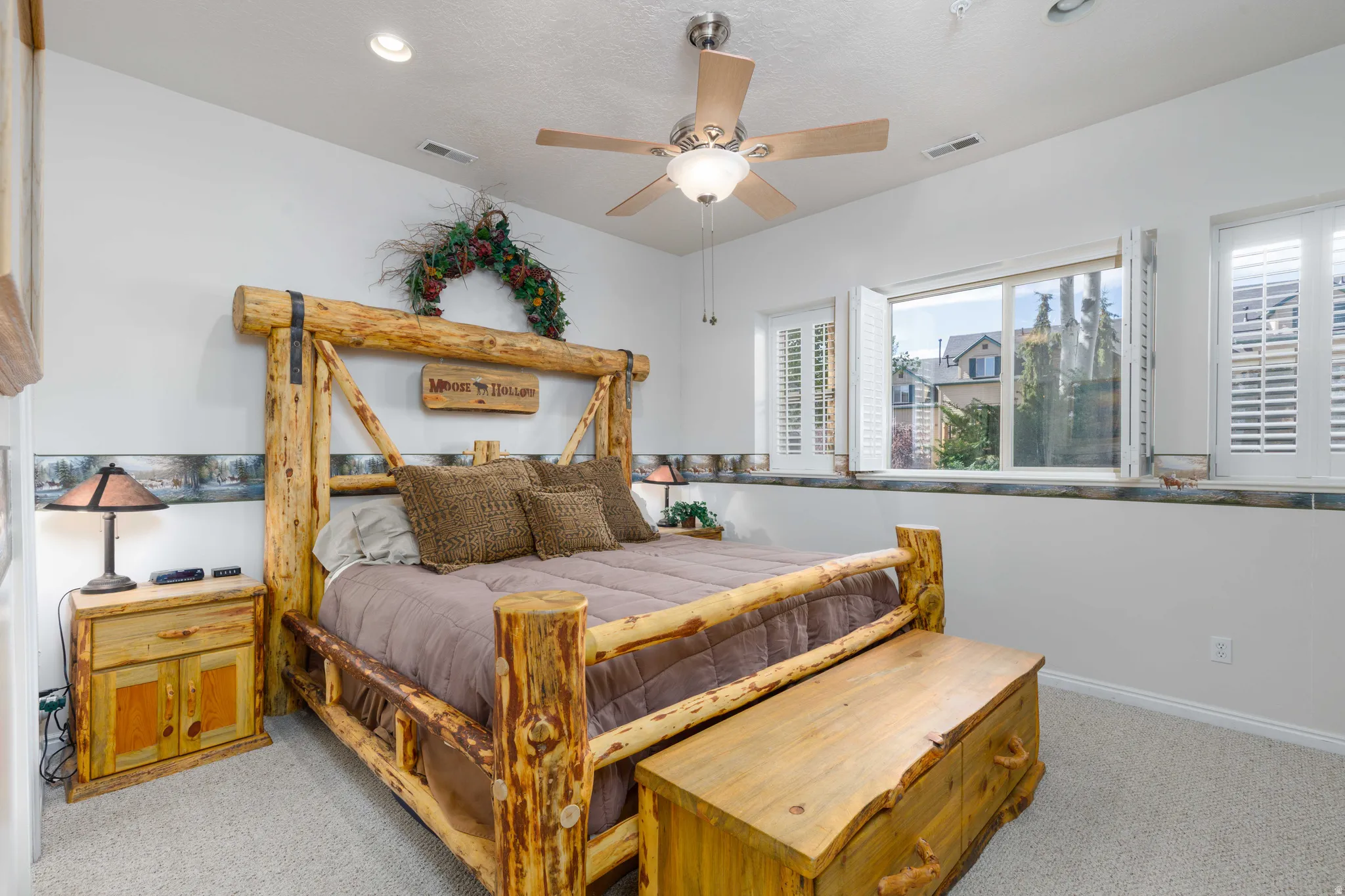 White walls, recessed lighting, and a ceiling fan with integrated lighting