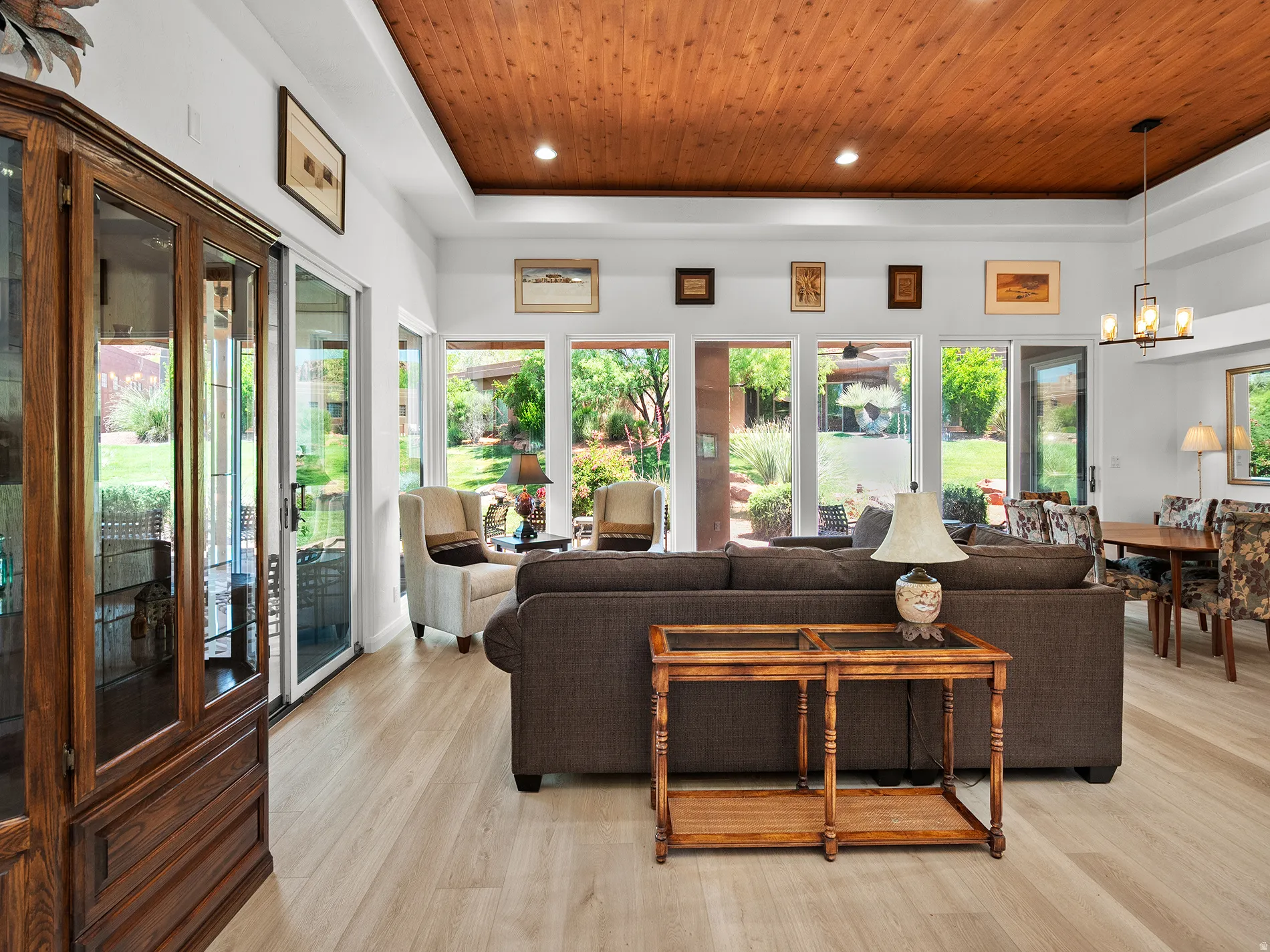 Wood-finish flooring throughout, complemented by a wood plank ceiling