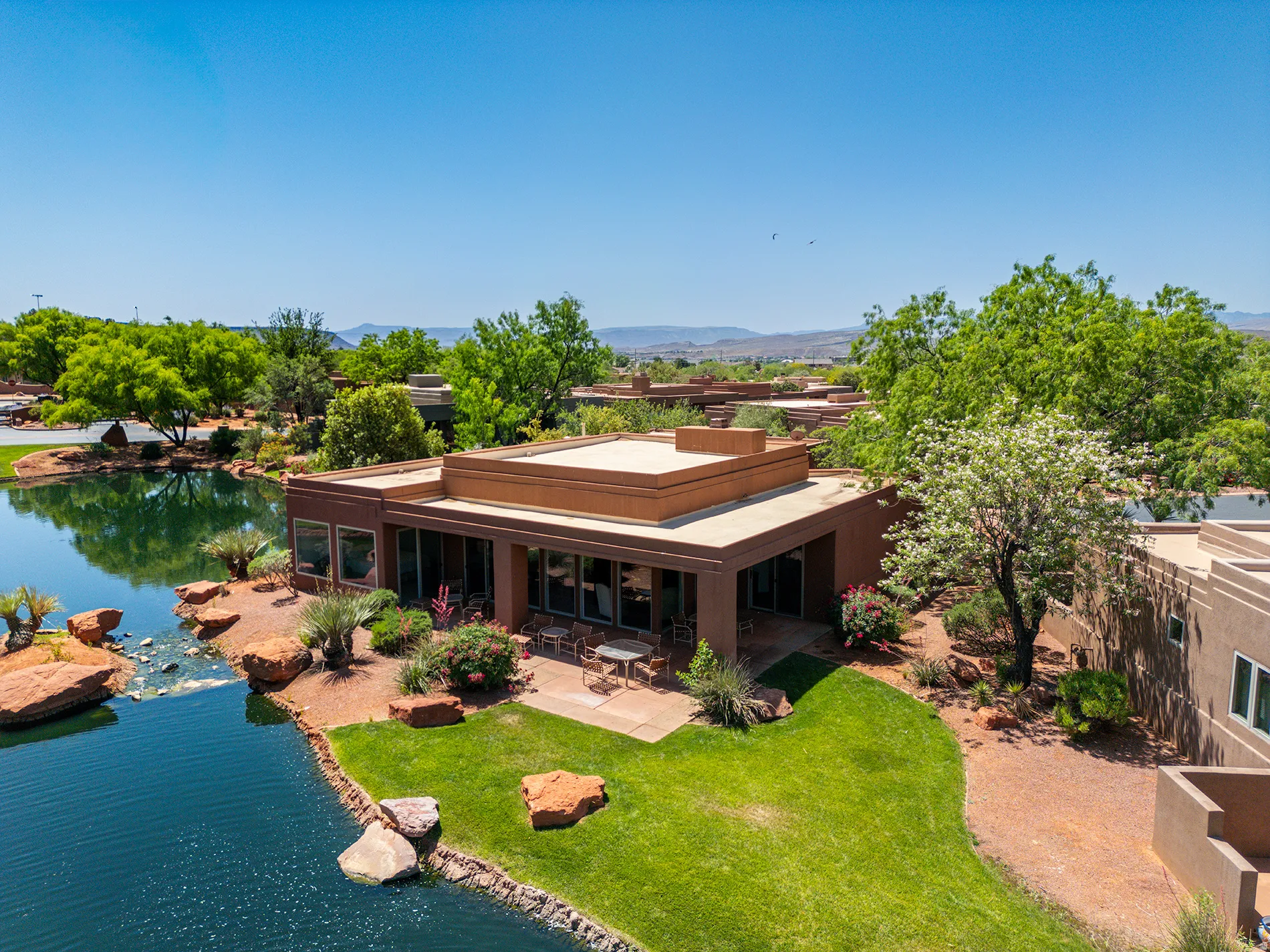 Expansive body of water with a natural rock shoreline