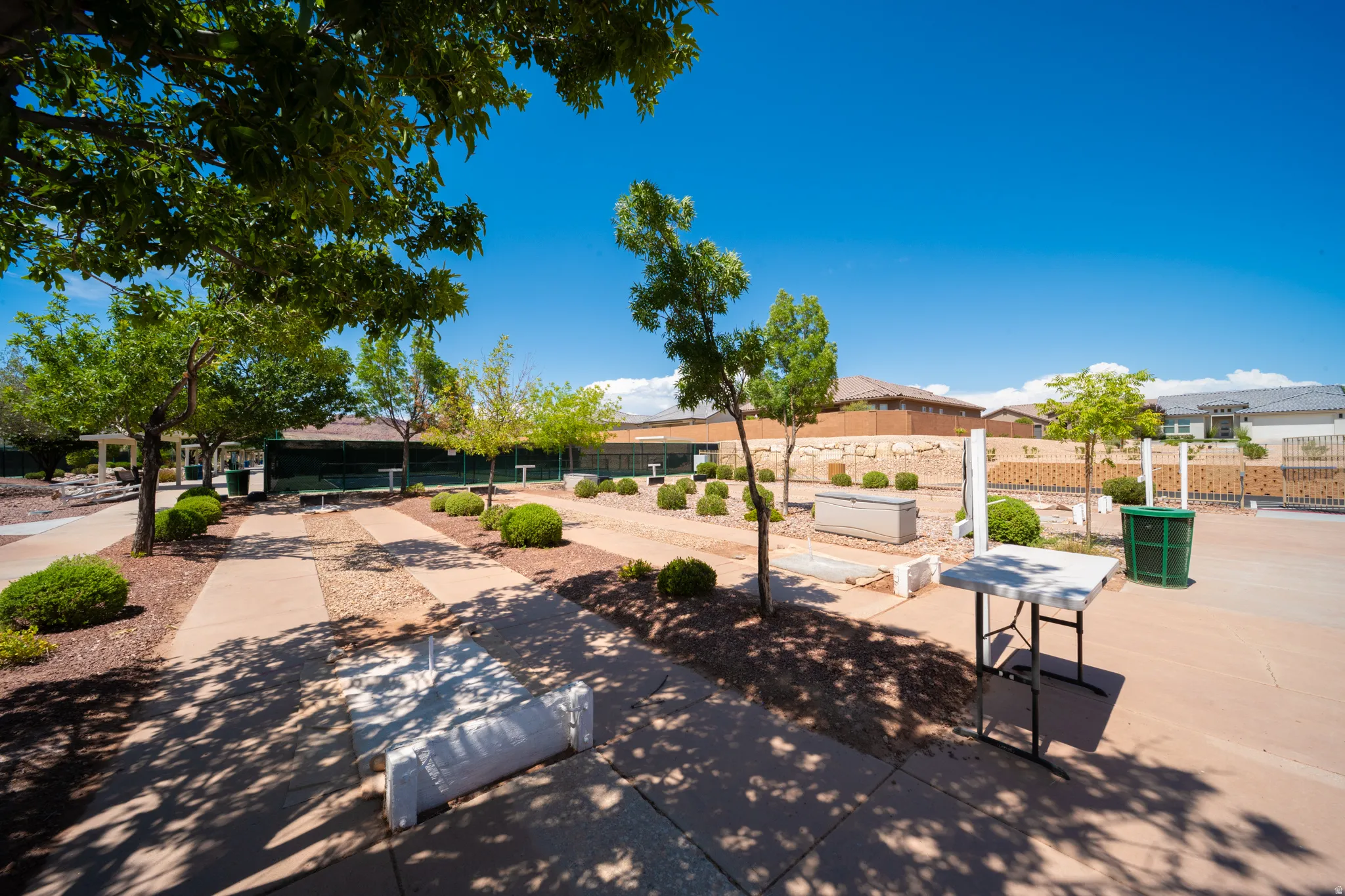 Hardscaped pathways with embedded gravel accents