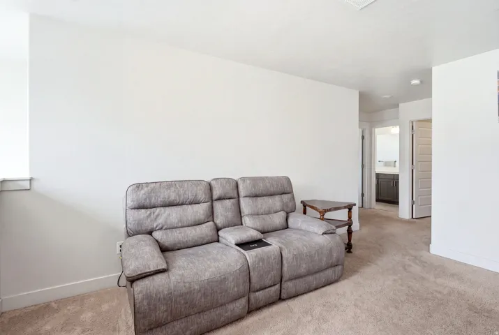 White walls and light neutral carpet