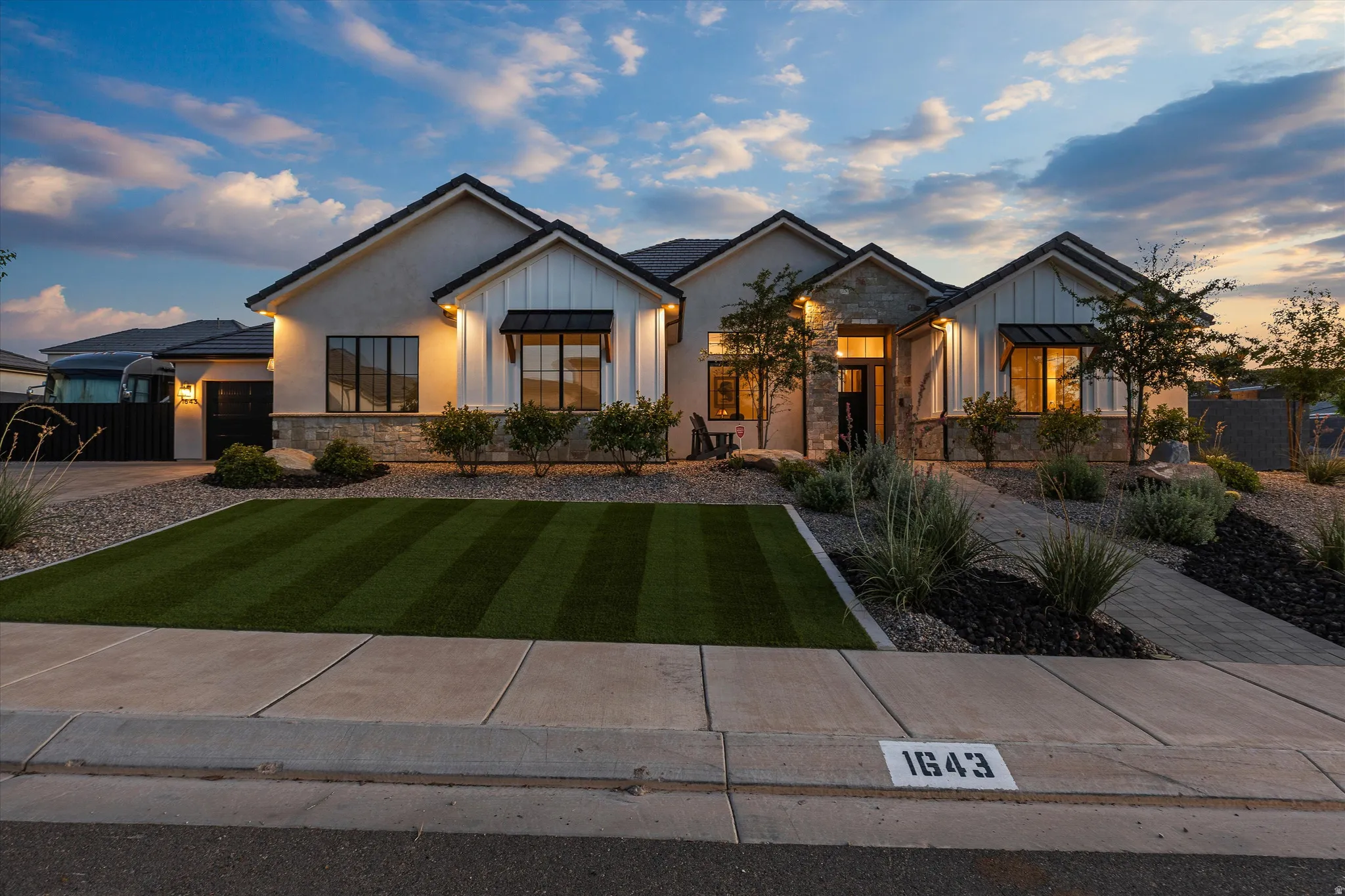 Turf and Exterior Lighting with Paver Pathway