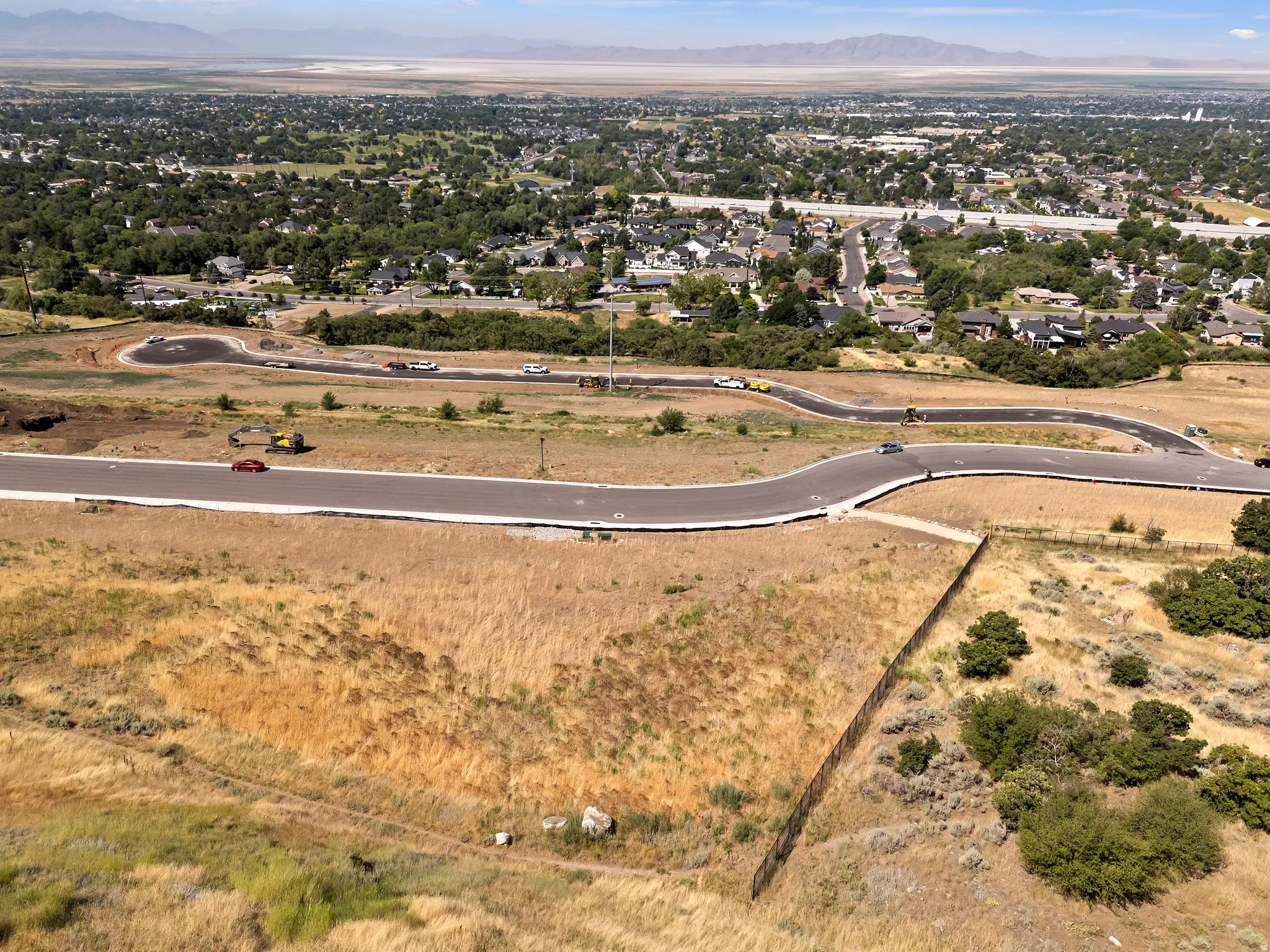 Developed land featuring paved roads and residential surroundings