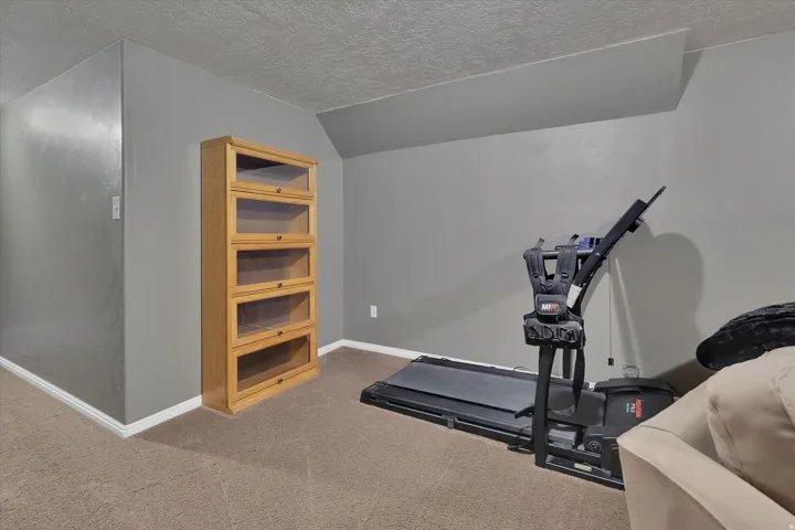 Carpeted flooring with painted walls