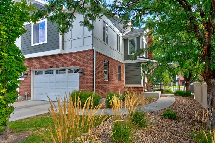 Brick and siding exterior with a two-car garage