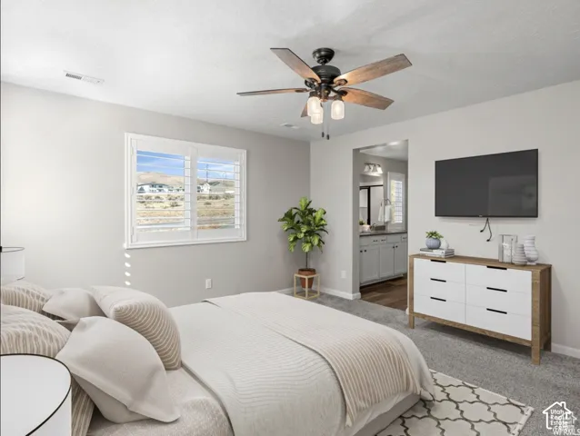 Bright interior with neutral wall colors and soft carpeting