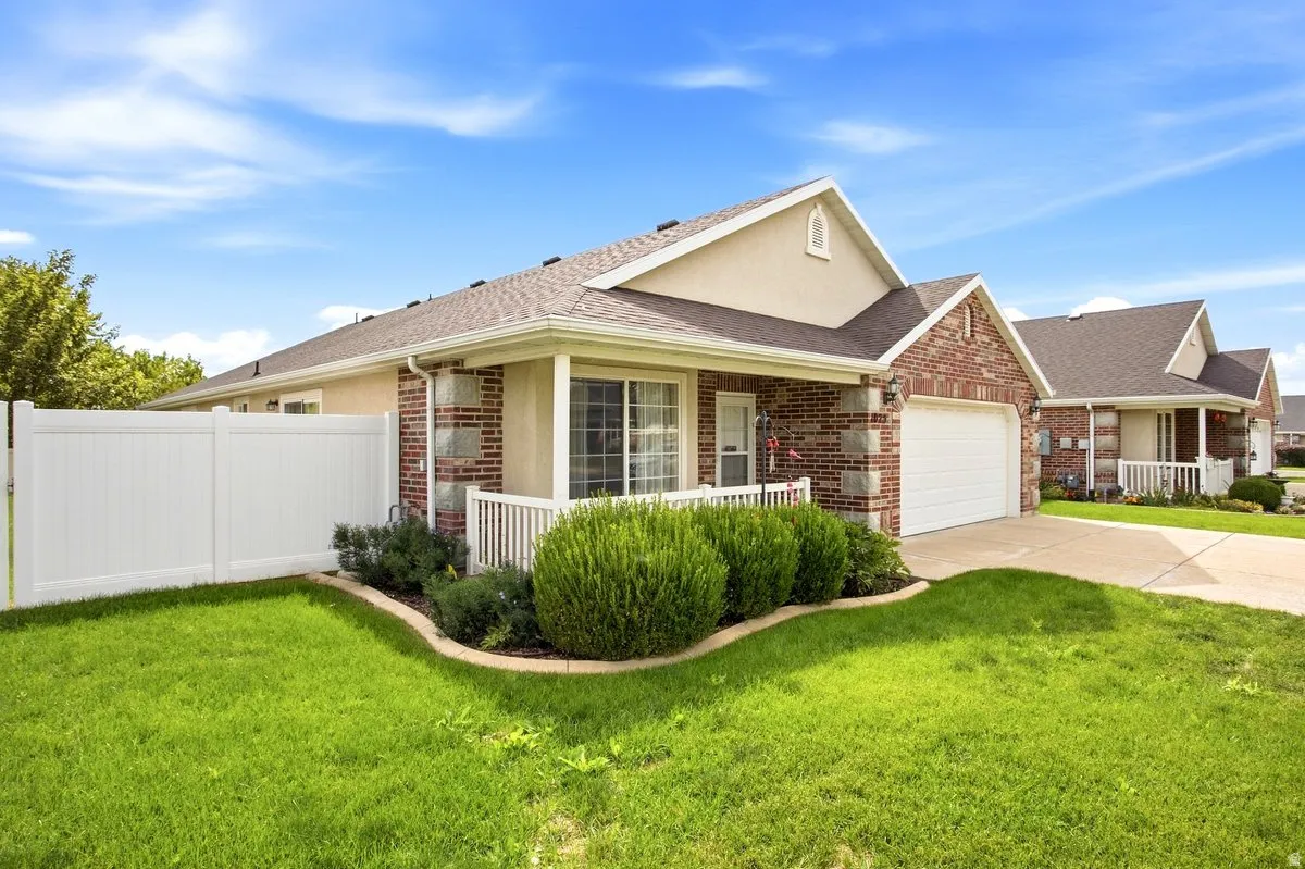 Brick and siding exterior with a gabled roof