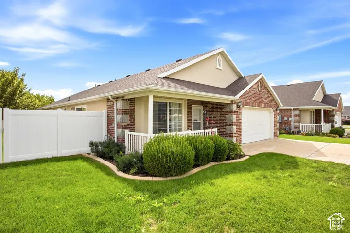 Brick and siding exterior with a gabled roof