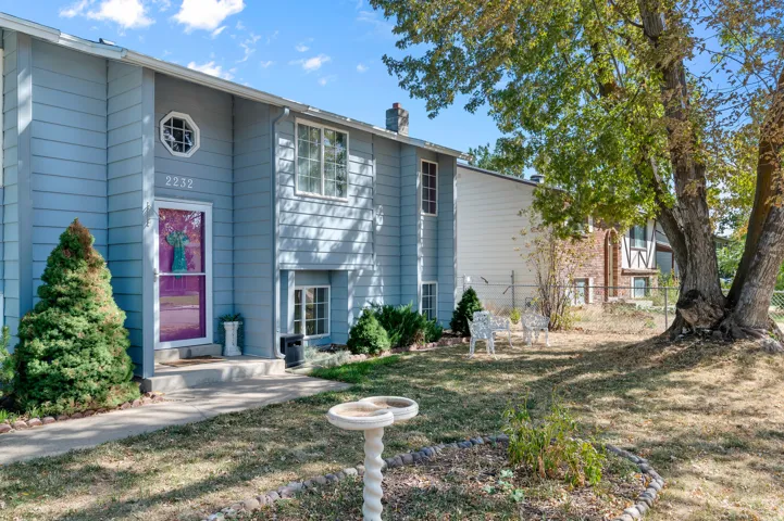 Light blue siding exterior with white trim