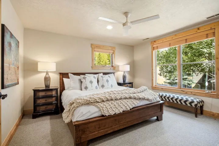 Recessed lighting, ceiling fan, and carpeted flooring