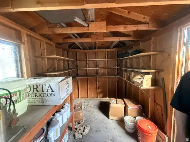 Exposed wooden beam ceiling with open rafters
