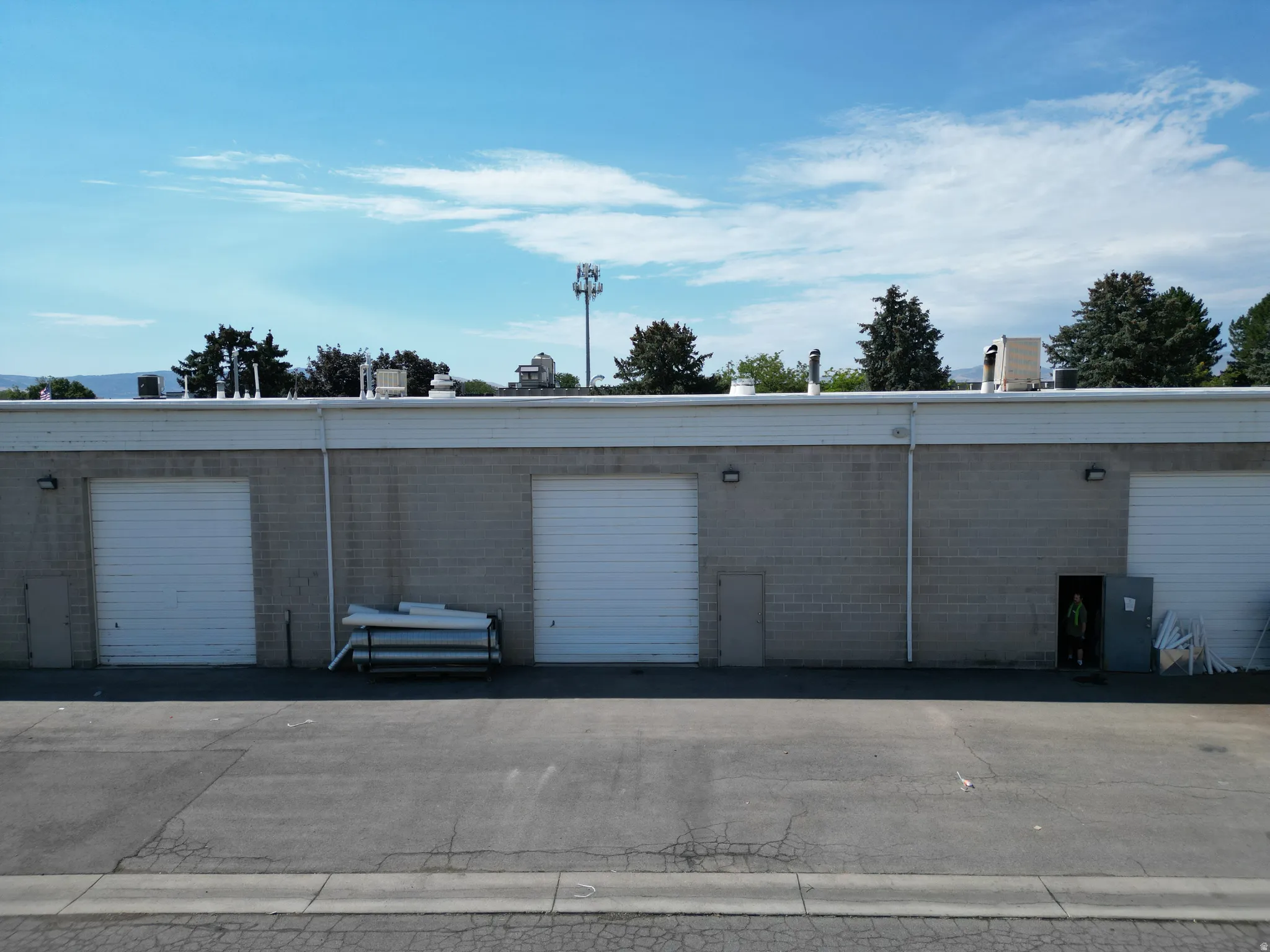 Block construction exterior with multiple overhead doors