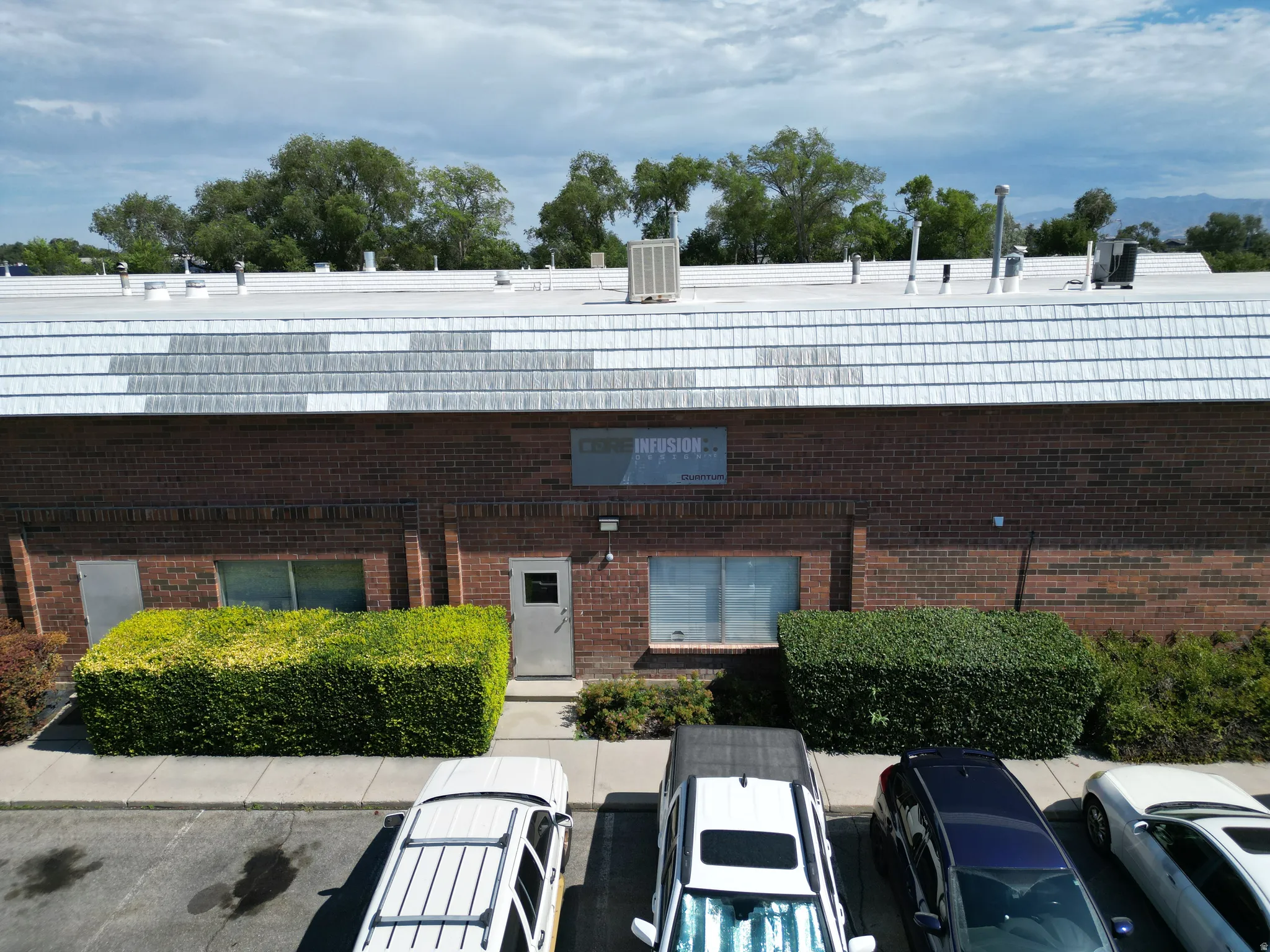 Brick exterior with a metal roof